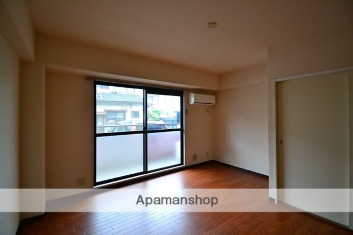 広島県広島市南区皆実町4丁目の賃貸マンションの居間