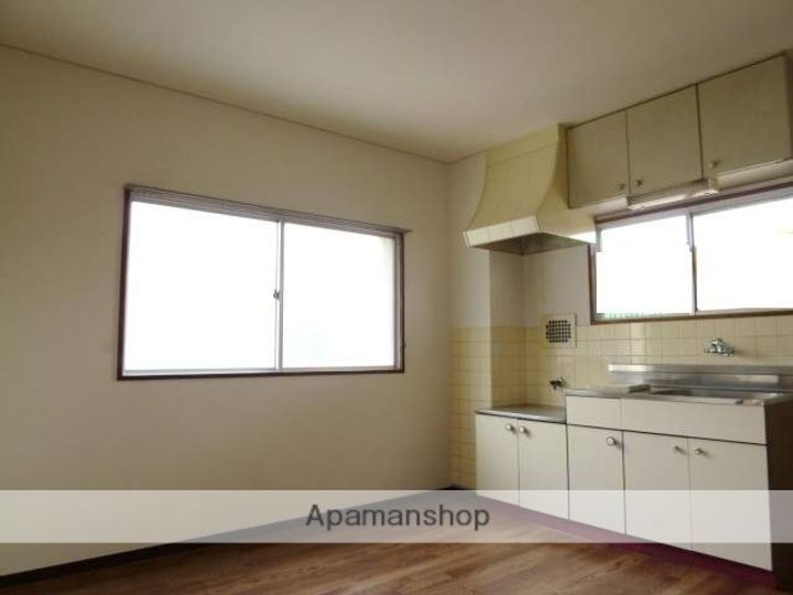 広島県安芸郡海田町大正町の賃貸マンションの居間