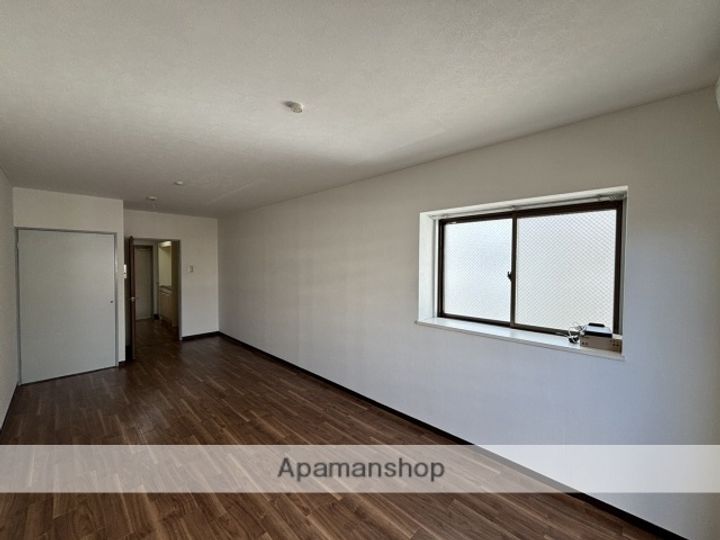 広島県広島市安佐南区西原2丁目の賃貸マンションの居間