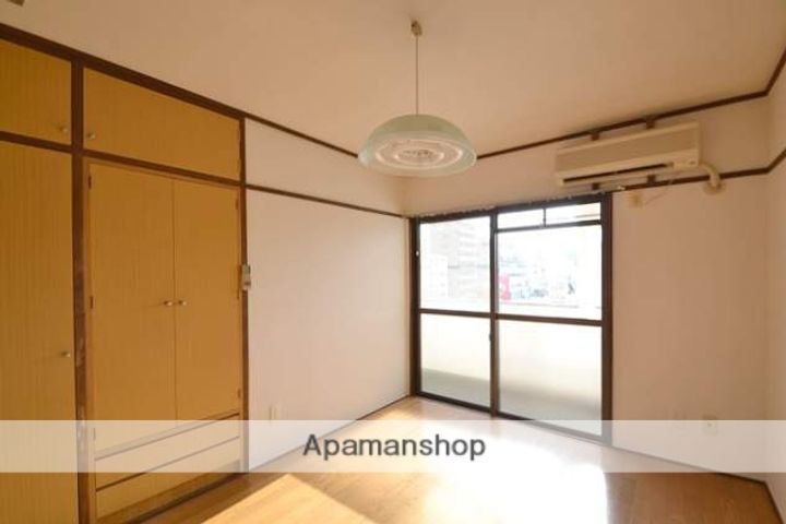 広島県広島市西区三篠北町の賃貸マンションの居間