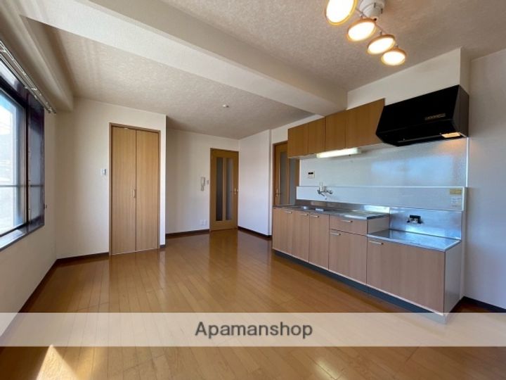 広島県広島市佐伯区千同2丁目の賃貸マンションの居間