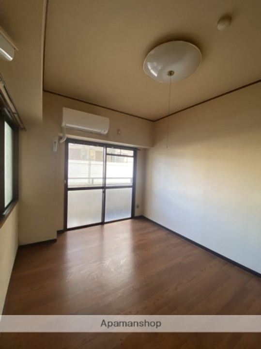 広島県広島市西区楠木町1丁目の賃貸マンションの居間