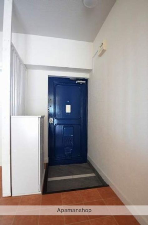 広島県広島市安佐北区可部5丁目の賃貸マンションの玄関