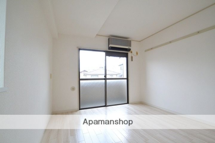 広島県広島市西区三篠北町の賃貸マンションの居間