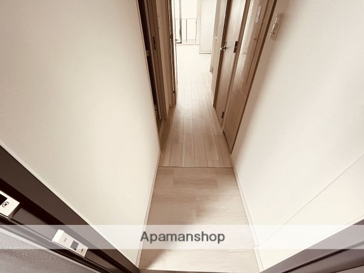 S-RESIDENCE空港通りawesomeの玄関