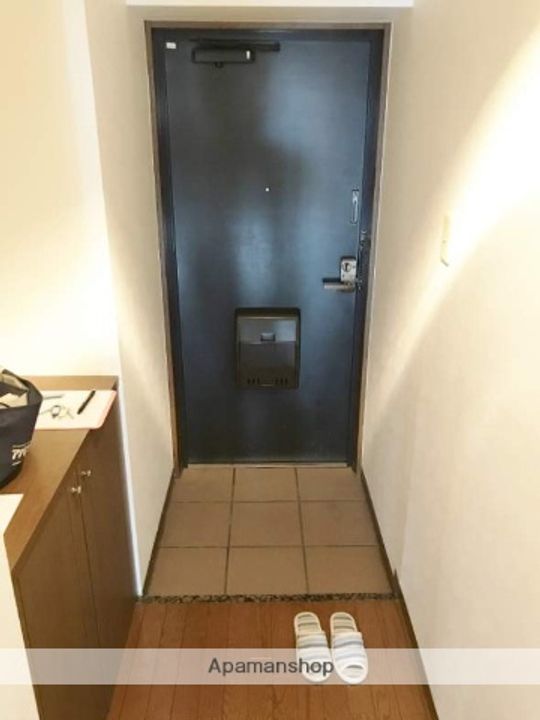 グランドール沖野上803の玄関