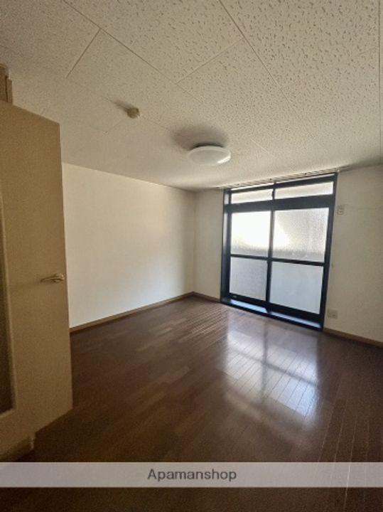 ジュネスヒロ305の居間