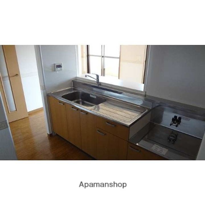 プラスパー旭通りの居間