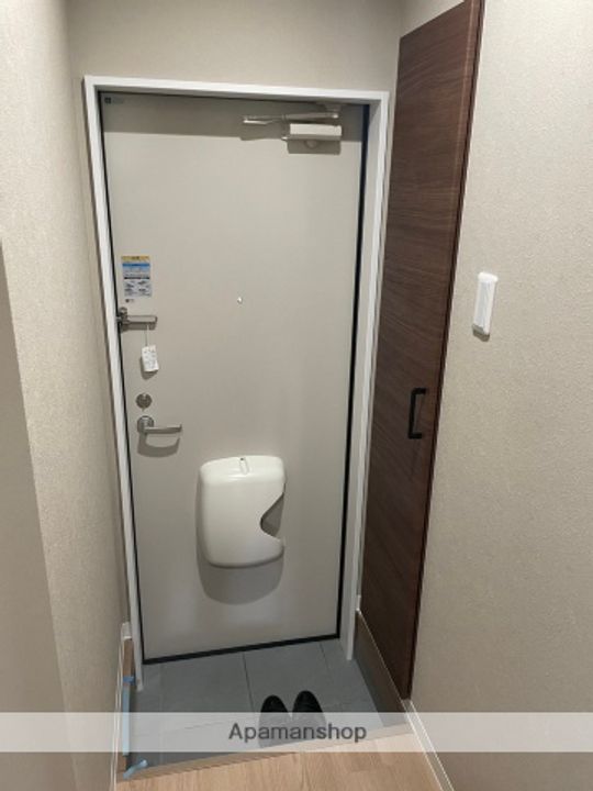 ガーデンヒルズ長者町111の玄関