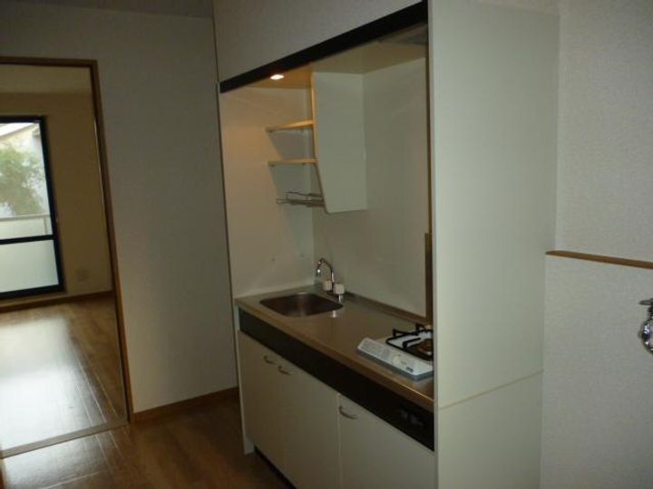 メゾン・ド・ブラン旭203号室のキッチン