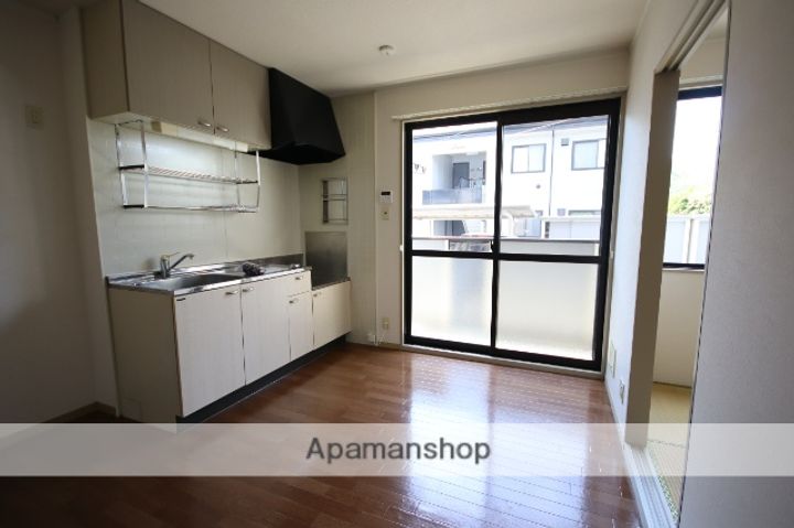 広島県広島市安佐南区上安2丁目の賃貸アパートの居間