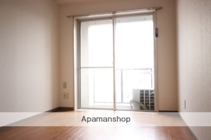 広島県広島市南区上東雲町の賃貸マンション405の居間