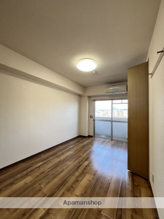 広島県広島市安佐南区大町東3丁目の賃貸マンションの居間