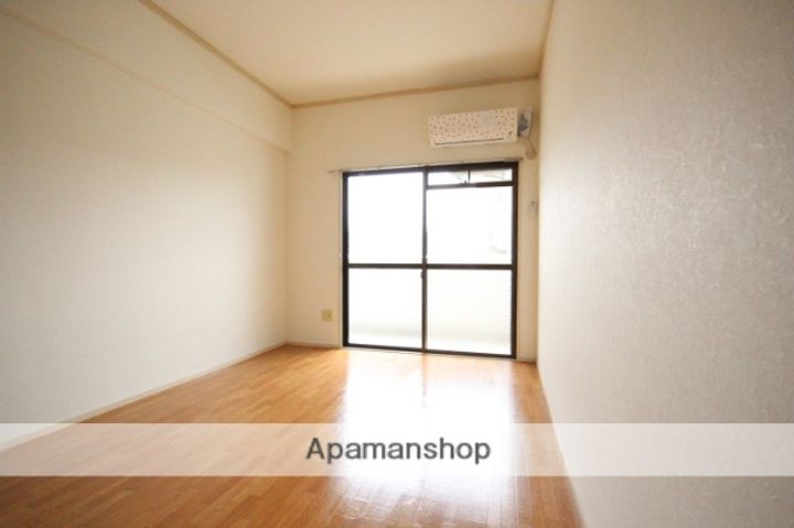 広島県広島市安佐南区西原4丁目の賃貸マンションの居間