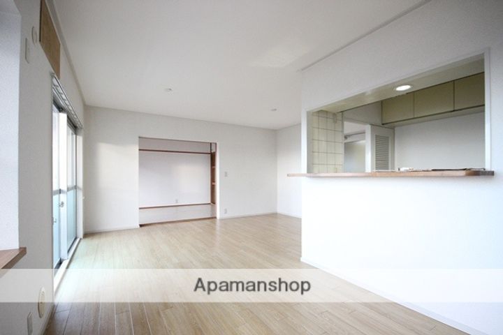 広島県広島市西区井口台2丁目の賃貸マンションの居間