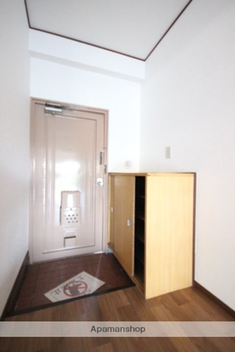 広島県広島市西区古江西町の賃貸マンションの玄関