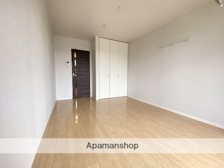 広島県広島市安佐南区安東6丁目の賃貸マンションの居間