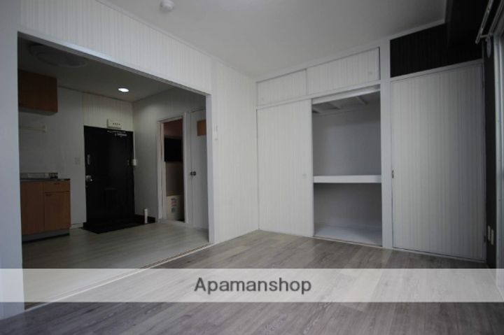 広島県広島市西区楠木町2丁目の賃貸マンション303の居間