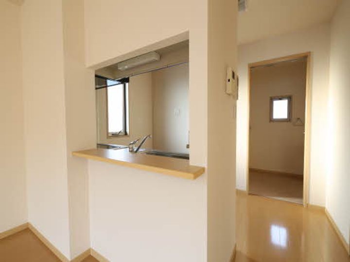 広島県広島市安佐北区三入1丁目の賃貸アパートの居間