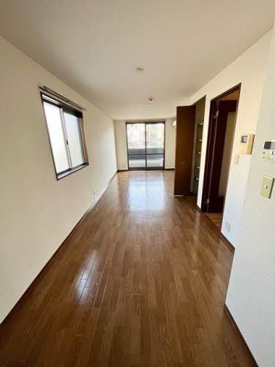 広島県広島市西区高須3丁目の賃貸アパートの居間