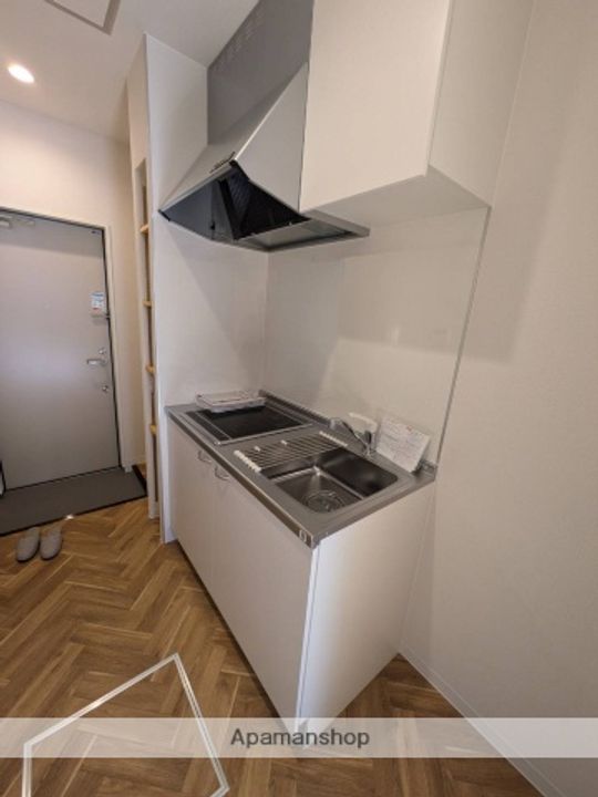 広島県広島市西区井口4丁目の賃貸アパート203のキッチン