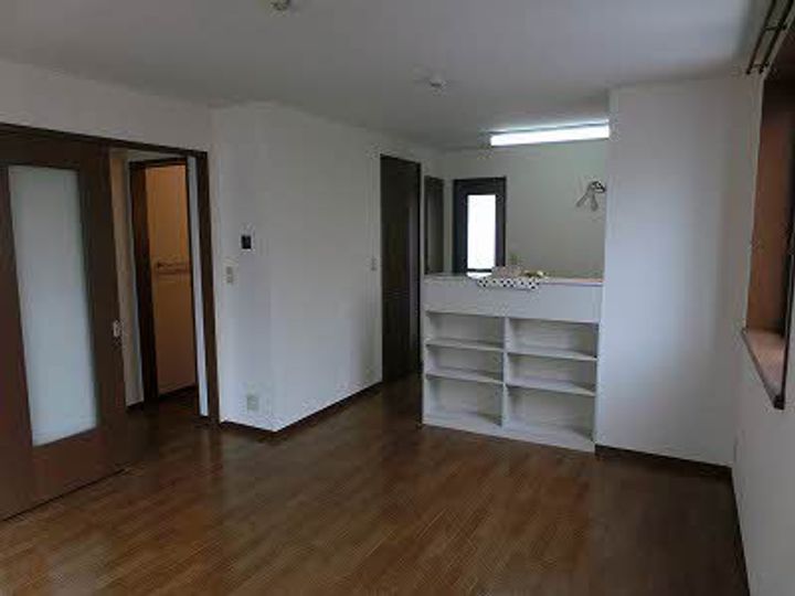 広島県広島市安佐北区落合南4丁目の賃貸アパートの居間