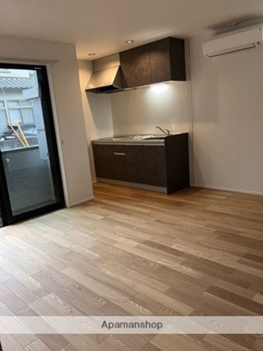 広島県広島市西区井口明神3丁目の賃貸アパートの居間