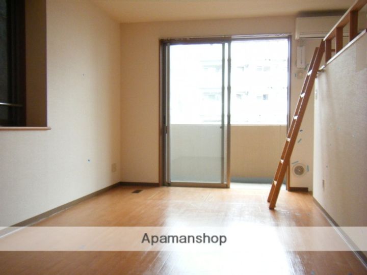 広島県広島市西区横川新町の賃貸マンションの居間