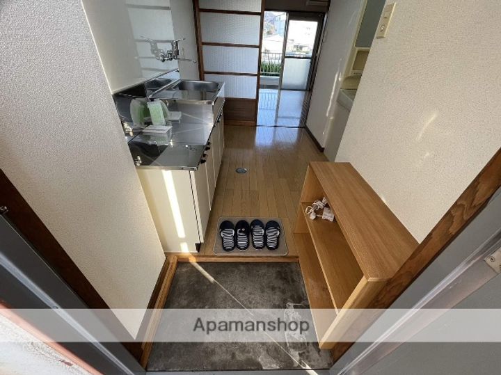 広島県東広島市西条中央4丁目の賃貸アパート104の玄関