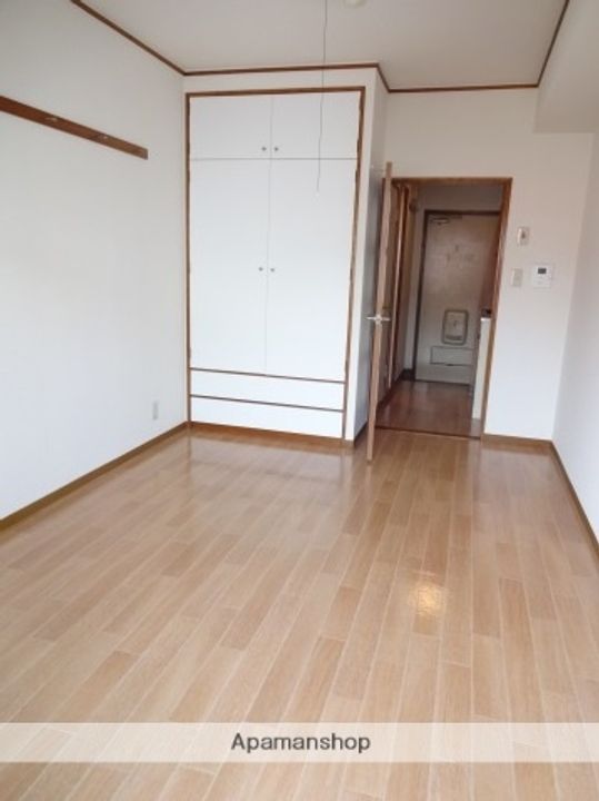 広島県広島市西区庚午北1丁目の賃貸マンションの居間