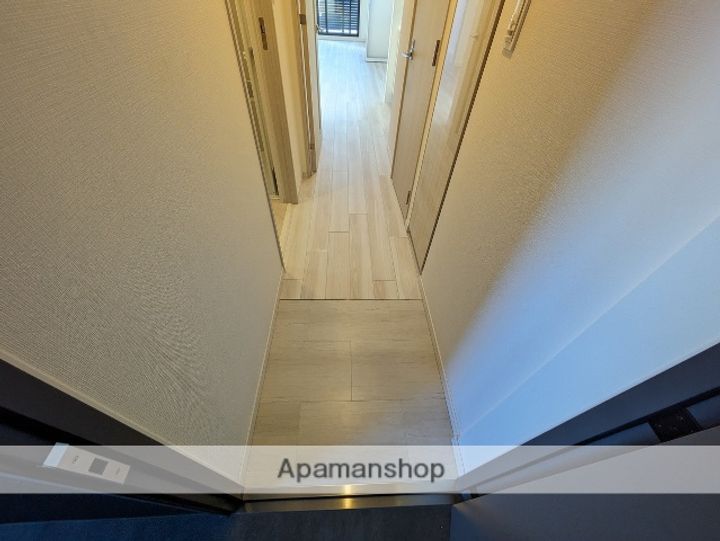 S-RESIDENCE空港通りawesomeの玄関