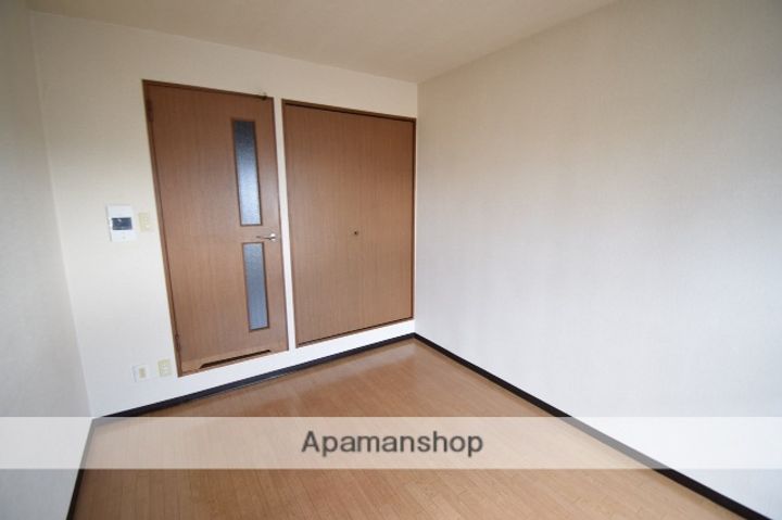 広島県安芸郡海田町南堀川町の賃貸マンションの居間