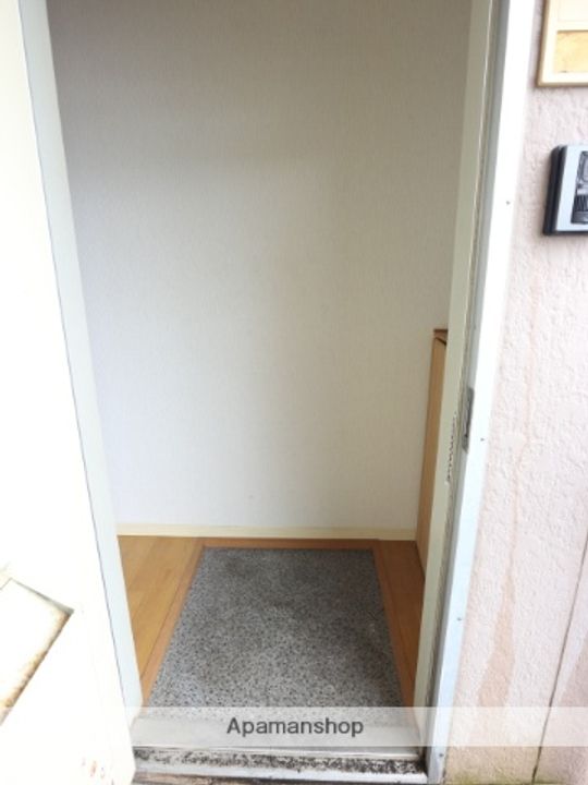 コーポ開華荘の玄関