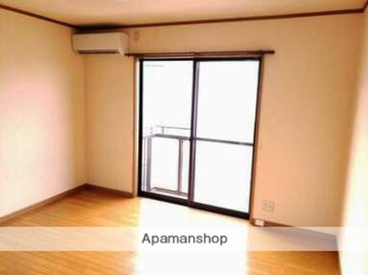 山口県下関市川中豊町7丁目の賃貸アパート201の居間