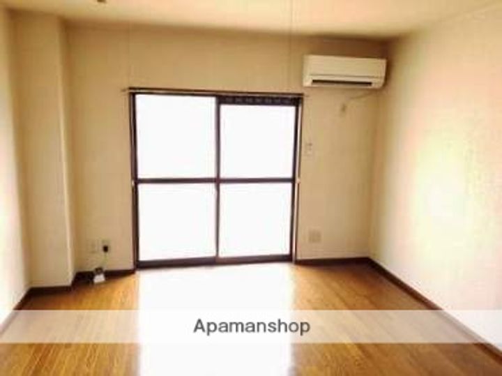 山口県下関市川中豊町7丁目の賃貸アパート205の居間