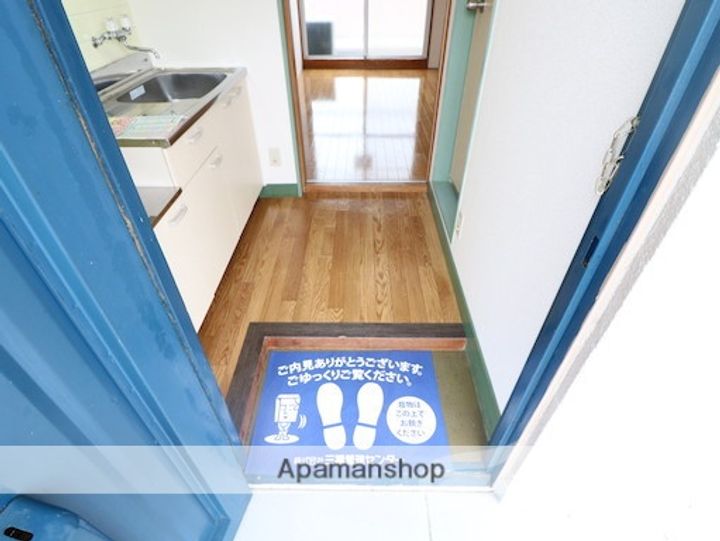 コーポおおさわ303の玄関