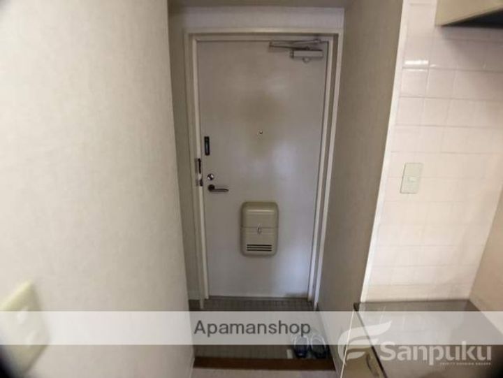 メゾンドファースト南久米403の玄関