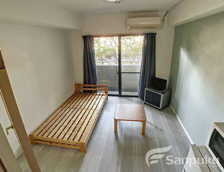 愛媛県松山市祓川1丁目の賃貸マンションの居間