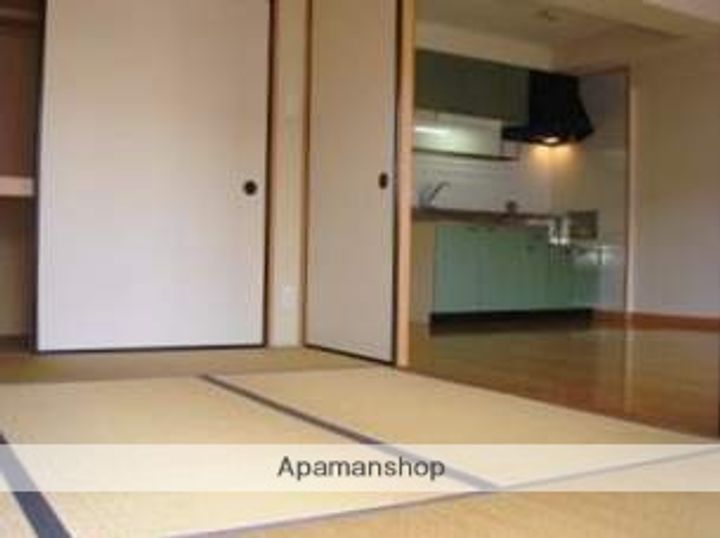 福岡県太宰府市朱雀4丁目の賃貸マンションの居間