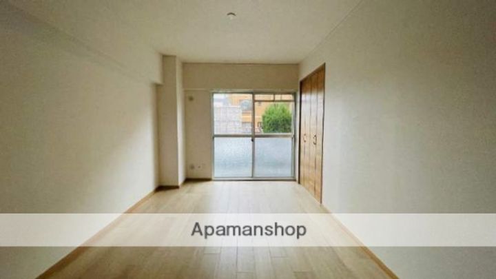 福岡県福岡市博多区諸岡3丁目の賃貸マンションの居間