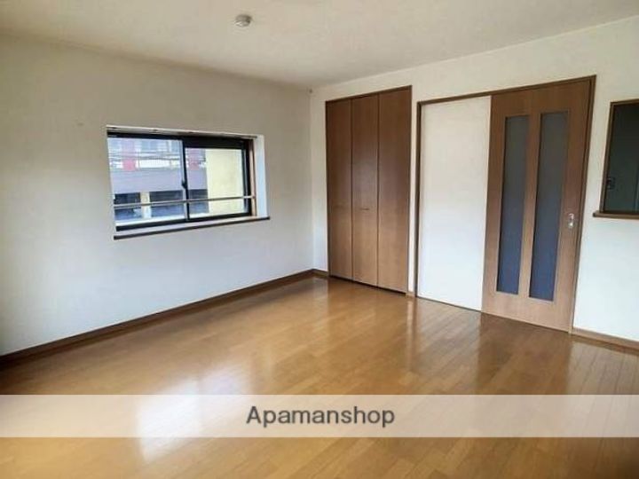 福岡県福岡市南区屋形原1丁目の賃貸マンションの居間