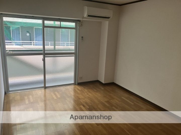 福岡県古賀市天神1丁目の賃貸マンション506の居間