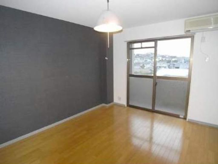 福岡県福岡市東区香住ヶ丘4丁目の賃貸マンションの居間