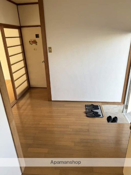 福岡県福岡市博多区月隈6丁目の賃貸アパートの居間