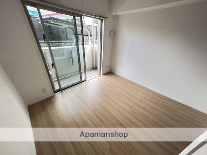 福岡県福岡市東区御島崎2丁目の賃貸マンションの居間