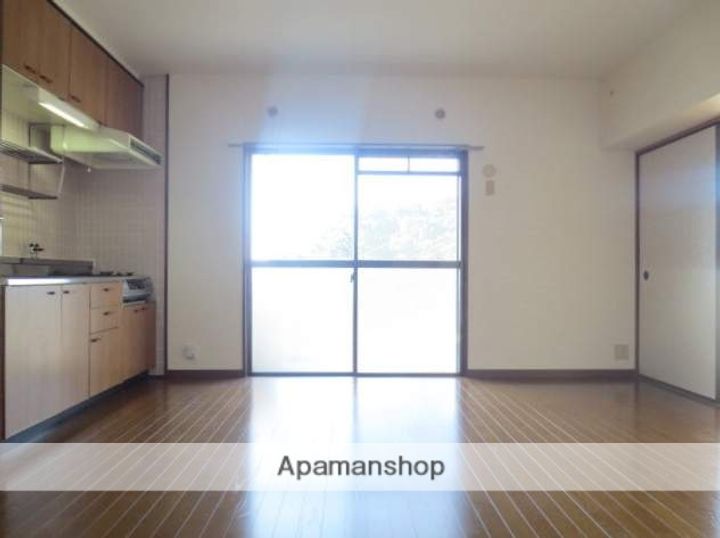 福岡県福岡市博多区月隈6丁目の賃貸マンションの居間