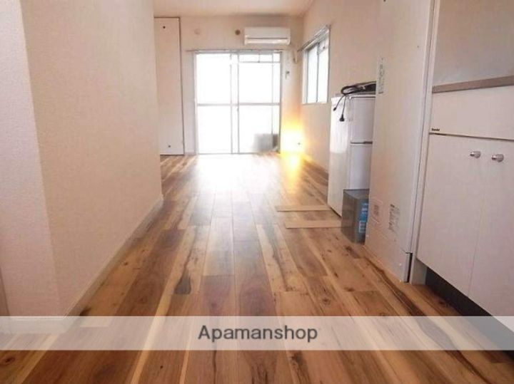 福岡県福岡市博多区美野島2丁目の賃貸マンションの居間