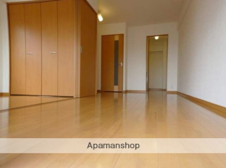 福岡県福岡市博多区吉塚6丁目の賃貸マンションの居間