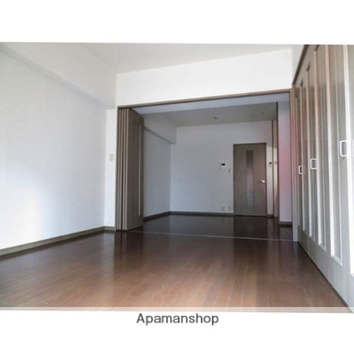 福岡県福岡市博多区吉塚本町の賃貸マンションの居間