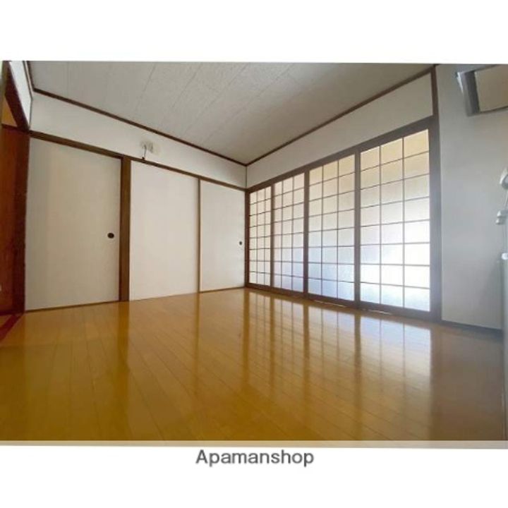 福岡県福岡市城南区神松寺2丁目の賃貸マンションの居間
